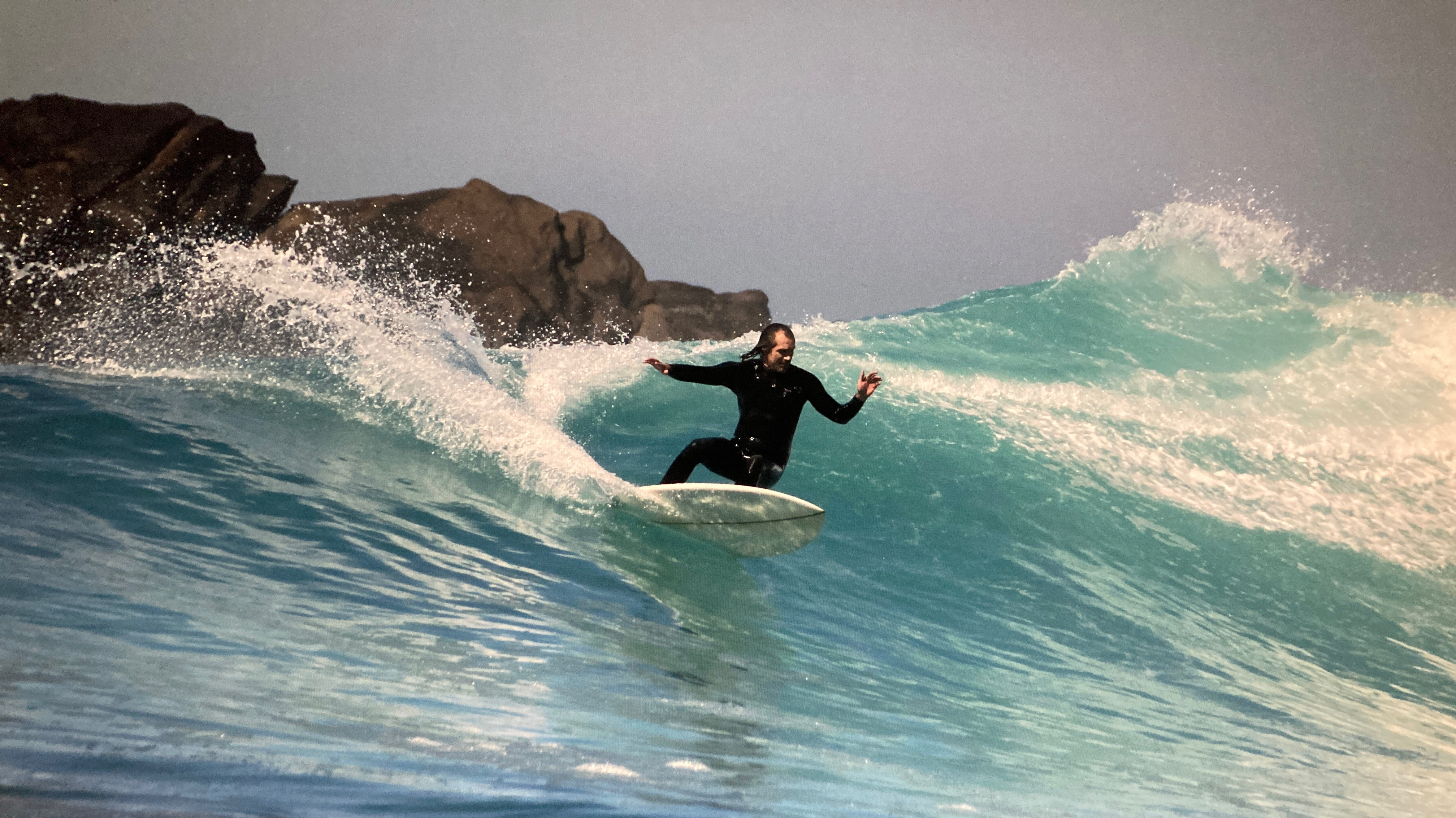 Matt Lamkin catching a wave in Baja